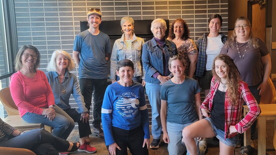 The author (front center) alongside members of a local SCBWI writers’ group