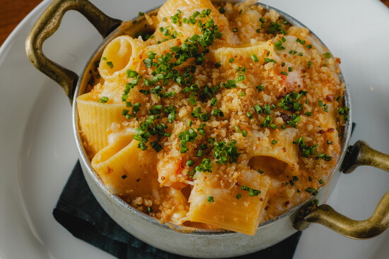 Juniper’s decadent lobster mac and cheese gives a comfort-food classic an indulgent upgrade. (Photo by Kevin Eduard White)
