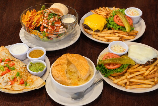 Comfort food at Norton’s in Highland Park, from stacked burgers and quesadillas to a hearty chicken salad and golden-topped pot pie. (Photo by Cat Rolfes)