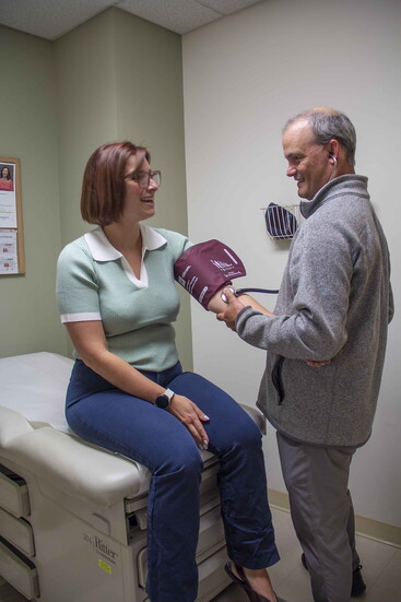 Brett Kolpan, M.D., Hunterdon Family Medicine at Riverfield with a patient.