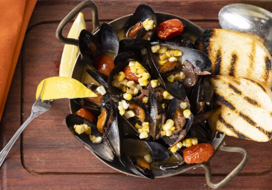 Pine Island mussels, roasted corn, oil cured tomatoes and marsala