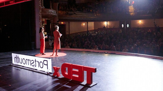 Anna Goldsmith and Kaarin Milne address the audience. Photo by Alyssa Duncan