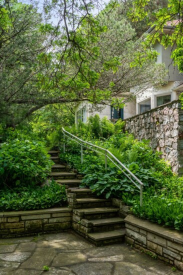 A Staircase Decorated Set in Stone Leads Up to the Sprawling Estate