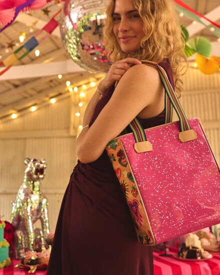Consuela's signature patterns, vibrant colors, and handcrafted details celebrate individuality while blending artistry with everyday function and comfort.