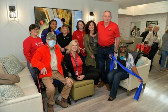 The late Terry Chapman (front left) and Kim Mills-Smith (to Terry's left) lead the renovation and design efforts with the Delta Tech Ops volunteers