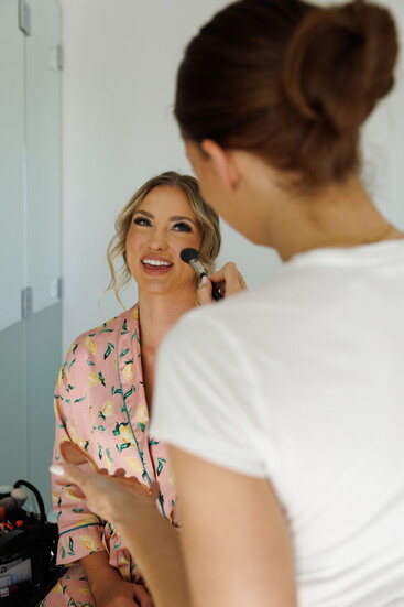 Jennifer Thompson doing Kaitlyn's makeup for the wedding photoshoot.