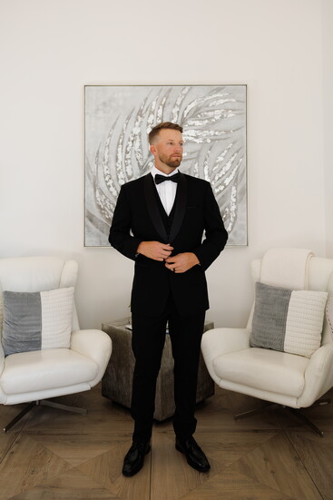 Jimmie Sherfy attired in the tuxedo provided by Friar Tux.