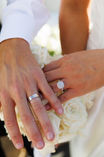 Jimmie and Kaitlyn Sherfy showing the wedding rings.