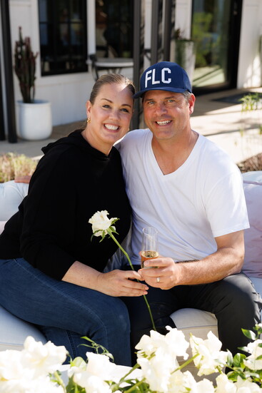 Victora and Bill Provost, the couple behind Bee Blissful Event Rentals, smiling for the camera.