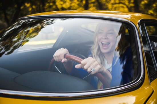 Eloise has fun in her Ferrari