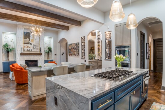 This kitchen - living area designed by Houston interior designer Shundra Harris offers a lot of functionality.