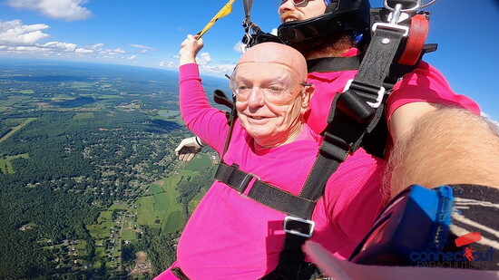 Mike even wears pink when skydiving! 