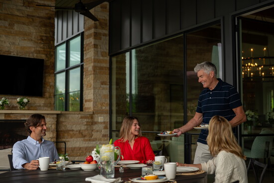 Indoor-outdoor living is central to life at Travis Club, with breezy patios and lakefront vistas. Photo by Jesse Levine
