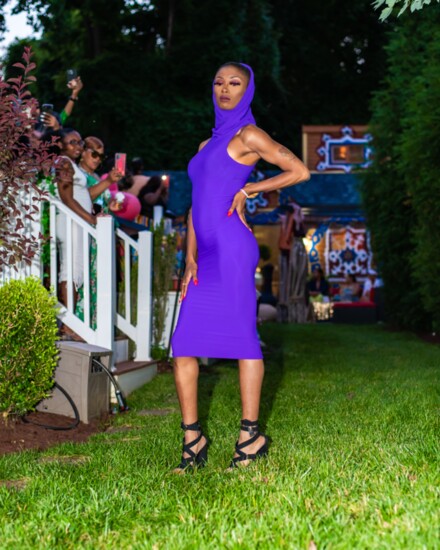 Don’t be afraid of color! This purple hooded dress can be an essential for all! Styles by Ethnicity Brand.