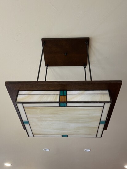 Even the llight fixtures channel Frank Lloyd Wright.
