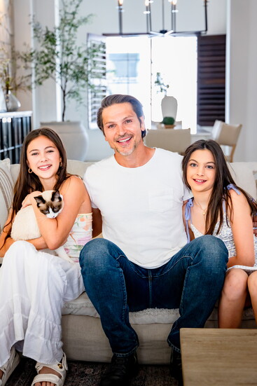 Rick with his daughters.