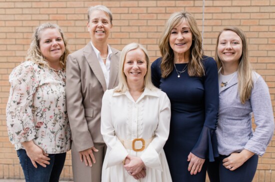 Kelley Burnett and team members.