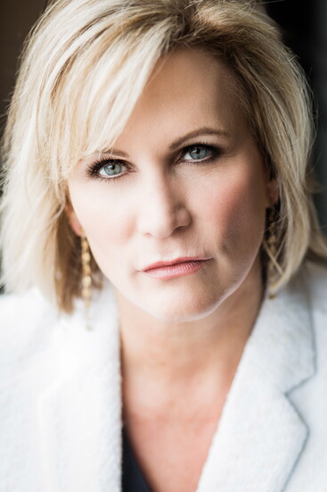 A serious expression can convey authority. 