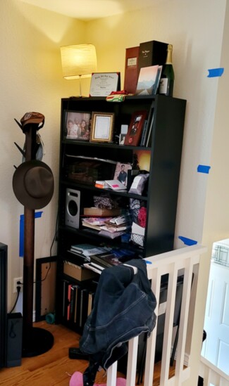 Before: landing Nook with open bookcase