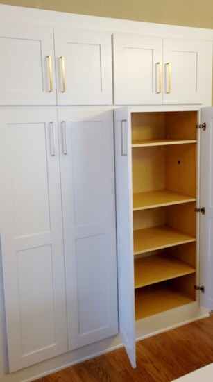 After: closet pantry with upgraded cabintry