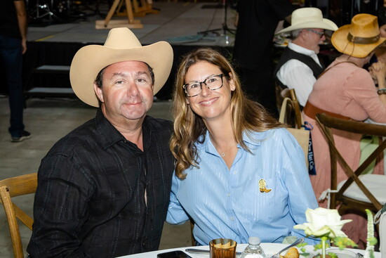 NTRC Volunteer Anat Kuperman with Her Husband Evan, Owners of Sand Dollar Boat Tours, at The Bootstrap Boogie Barn Dance