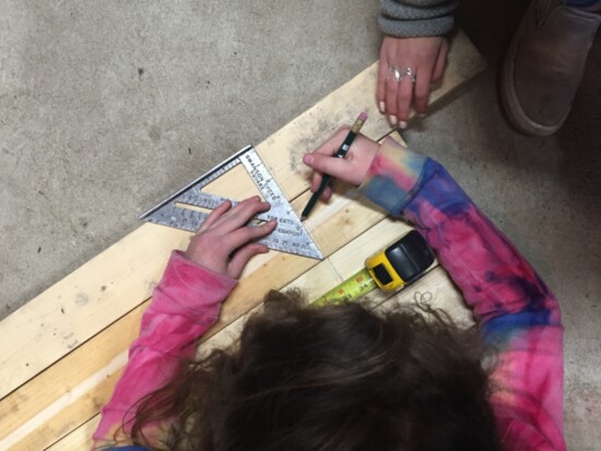 Youth learn essential carpentry skills through Build, Repair, Grow.