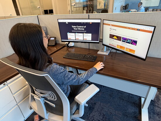 Kemba Credit Union Marketing Coordinator Skylar Barkley demonstrates Banzai, an educational partner that provides hundreds of online learning tools for free.