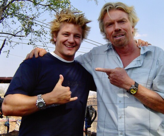 Nelson with Sir Richard Branson after winning $1MM on Branson's "The Rebel Billionaire".