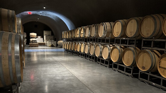 Barrel wine cave at Figgins Winery, where time and craft transform Walla Walla’s harvests.