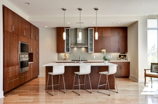 In the kitchen of this staged home, sold by Traudel Lange, the space shines with a minimum of decor. The sleek lines ensure that it will have a wide appeal.