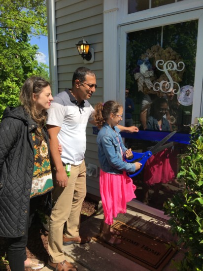 Habitat brings another family home.
