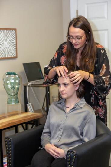 Low Energy Neurofeedback System Therapy in action. Photo credit: Penny Rawls Photography
