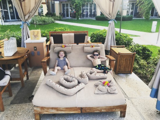 Tiny guests living large in a poolside cabana complete with white-glove butler service