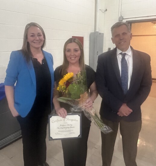 Dr. Laura Bassett, Eisenhower Principal, with Jaclynn Hurley and Superintendent Bob Beers