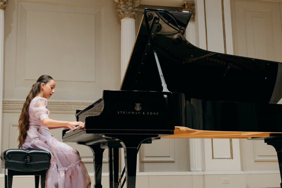 Student Guinevere Villegas playing at Carnegie Hall in New York City