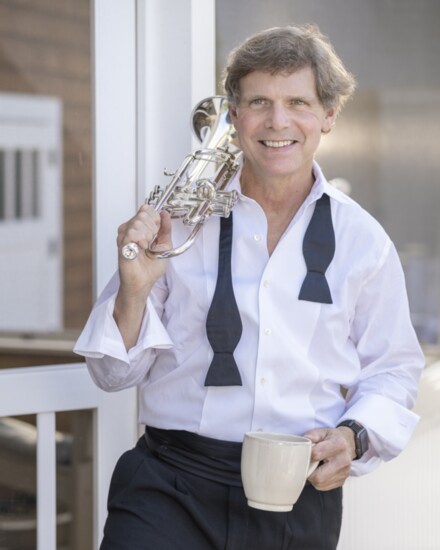 Principal Trumpeter Charlie Johnson is the Head Squash Pro at the Yale Club in NYC, comfortable both on and off stage & court.