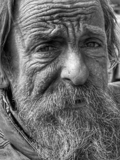 His name is Yahweh. Everyday he offers coconuts to the ocean to purify his soul as he prepares for Heaven. He also said that he used to be Sean from Colorado.