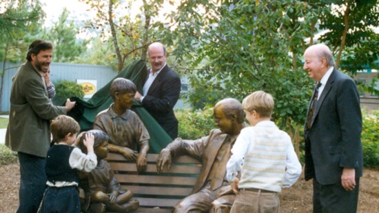 Unveiling the first sculpture of George Mitchell and his grandsons