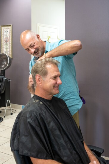 Joe Zottola has been styling men's and women's hair for four decades. Here, he styles a client at Venice's Ciao Bella Salon.