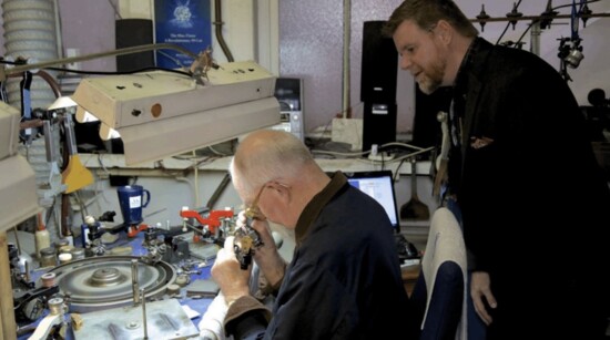 John working with a diamond cutter in Antwerp, Belgium 