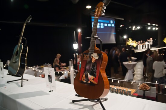 Signed Brad Paisley guitar from the 2016 Hammers & High Heels silent auction./Photo by Sarah Bailey Photography