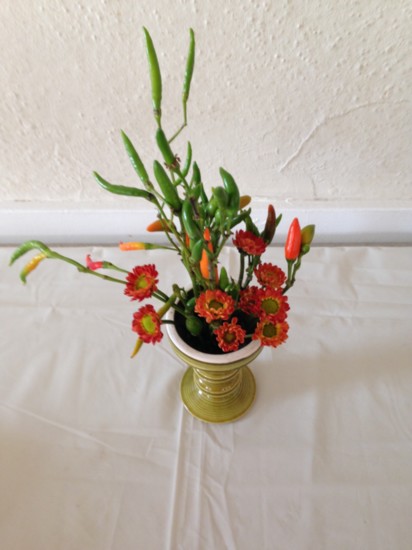 Flower arranging is one of the activities at the club.