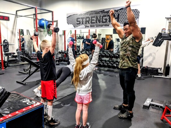 Personal trainer Paul Elmore customizes exercise for children, too. Photo by Dena Marks 