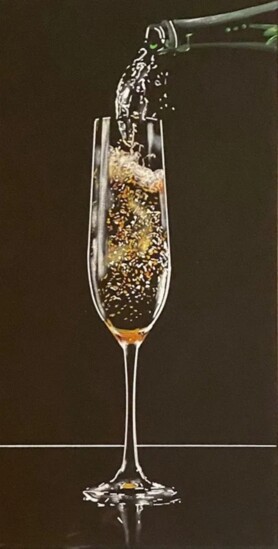 Bubbles of Champagne fizz and pop