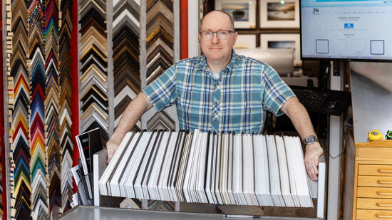Joel Kurlan inside JW Frame Crafters in Glastonbury.
