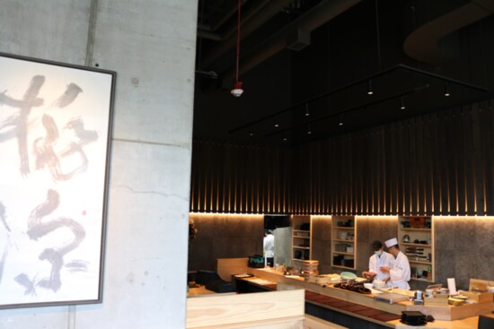 Calligraphy by Ricky Kashiba above the sushi bar at Takai by Kashiba