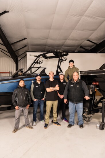 Dan Lay, third from left, and Warren Freece, far right, with the Active Water Sports Redmond team. 