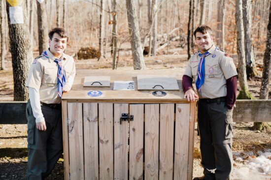 Alex and Andrew Noviello near trash and recycling bins Andrew created in Washington Valley Park