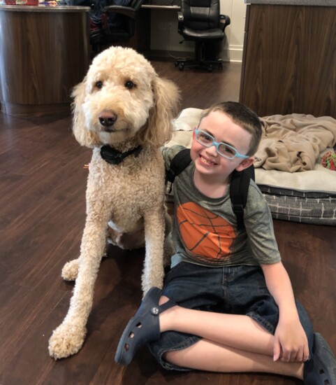 Elijah and the RMH house dog, Alphie.