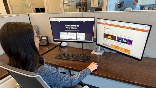 Kemba Credit Union Marketing Coordinator Skylar Barkley demonstrates Banzai, an educational partner that provides hundreds of online learning tools for free.